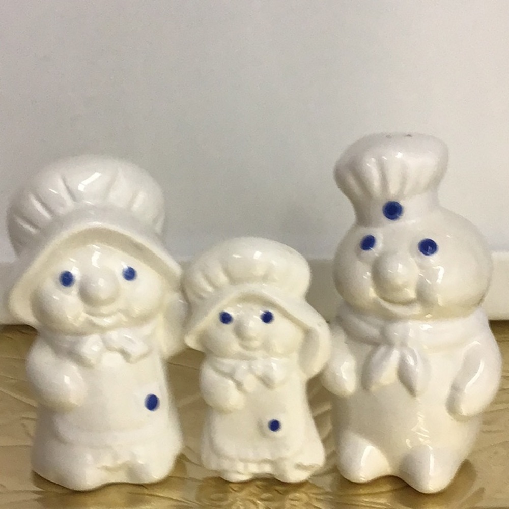 PILLSBURY DOUGHBOY SALT AND PEPPER SHAKERS. PLUS A PILLSBURY MAGNET
